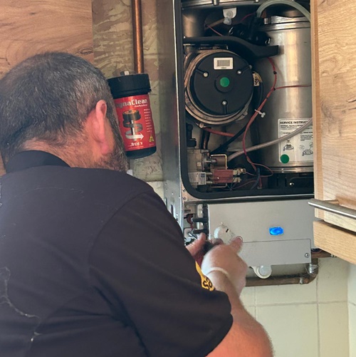 Jamie Sinclair servicing a boiler